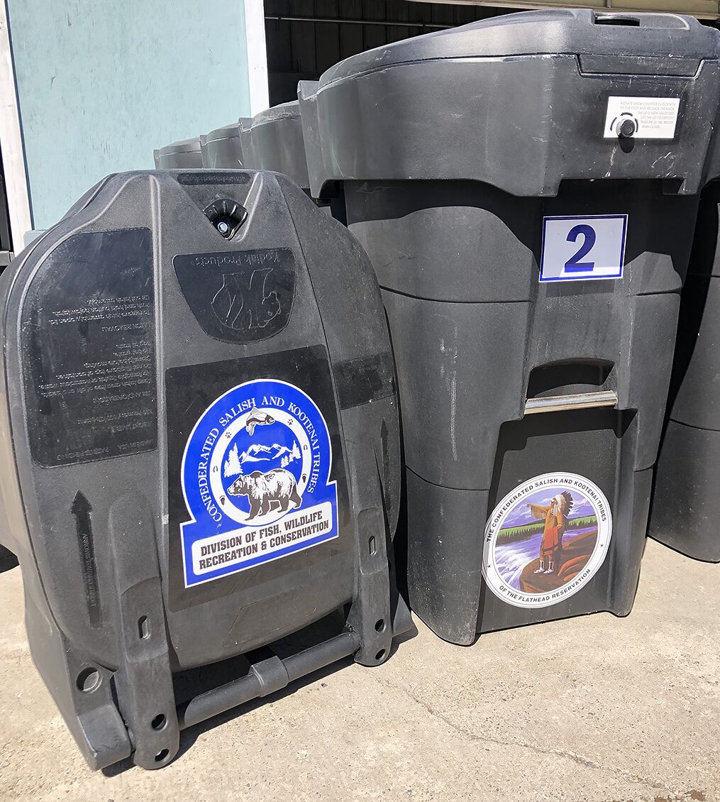 Bear resistant garbage containers